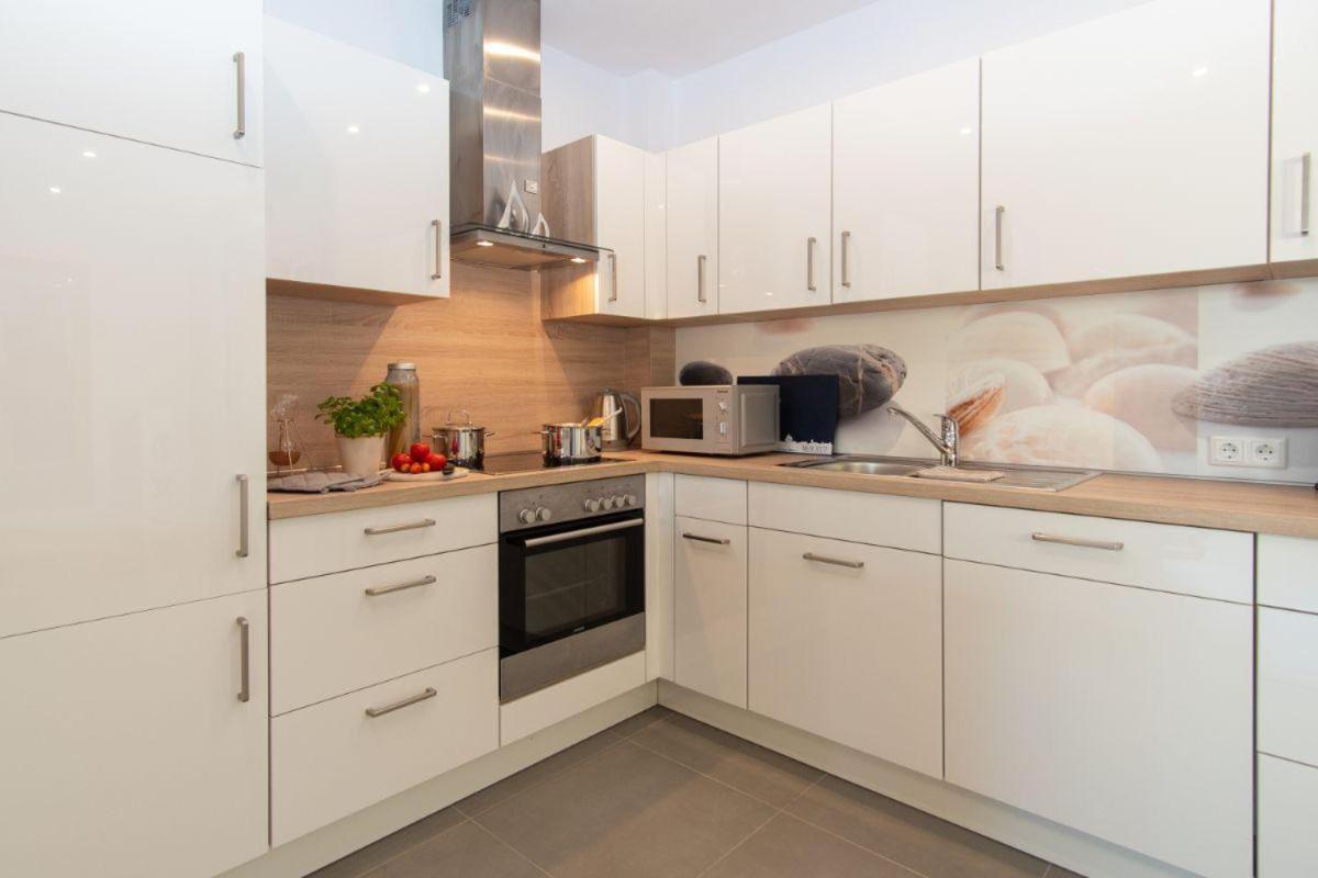 Haus-Wilhelmsplatz-Wohnung-Heimathafen Heiligenhafen Esterno foto